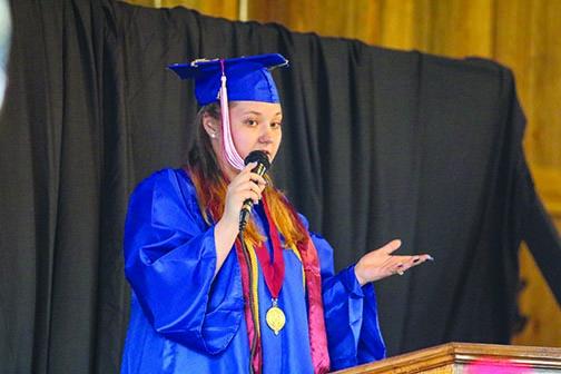 Putnam Edge High School Valedictorian Haley Wilson shares remarks with her classmates Thursday evening during the ceremony at Coventry Oaks Farm in Palatka.