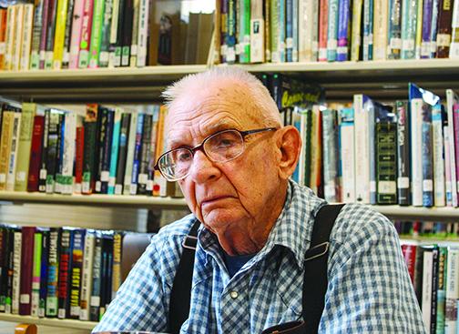 Lifetime Bostwick resident Charlie Wilkinson recalls his school years at Bostwick School from 1940-1948 while sitting in the former school building that is now the community library.
