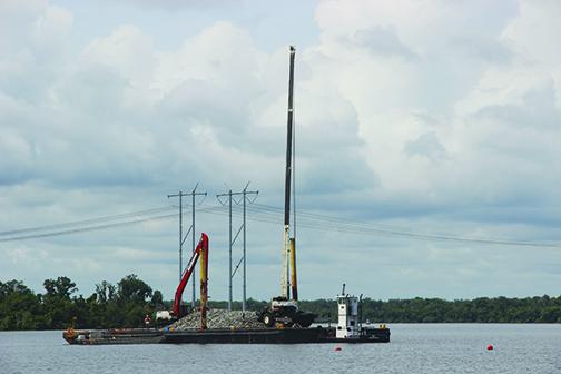 A barge carrying a crane struck a power line in East Palatka, affecting thousands of homes Thursday. Rolling blackouts were conducted throughout the day to avoid overloading the grid.