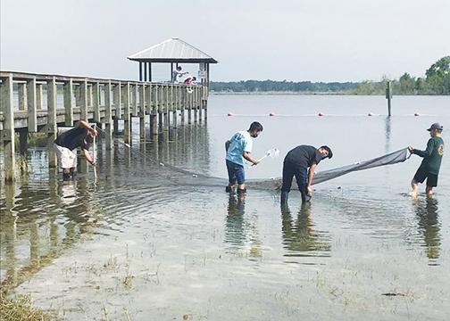 Crescent City High School students at Crescent Lake participate in a water resources field study program through the St. Johns River Water Management District Blue School Grant Program. 