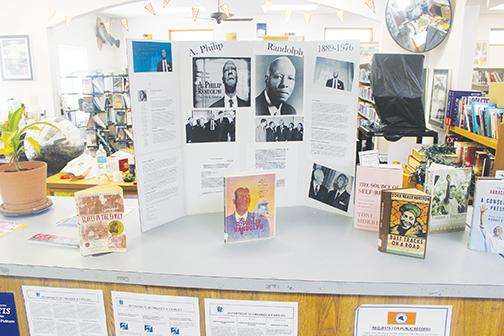  Information about Randolph is displayed at a local library.