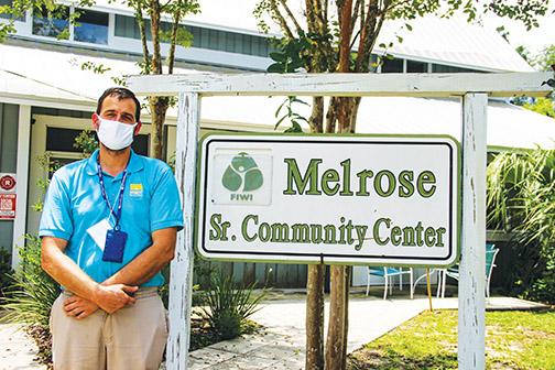 Chris Westmoreland, who works for the Florida Department of Health in Putnam County, stands outside the Melrose Community Center on Friday where he helped residents register for the COVID-19 vaccine.