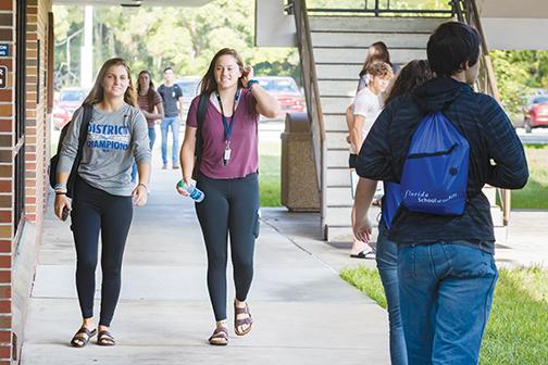 Students at St. Johns River State College make their way throughout the Palatka campus on the first day of the fall 2019 semester. The fall 2021 semester is slated to begin Monday.