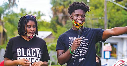 Dar’Nesha Leonard and Tevel Adams address the crowd at a protest they organized in August 2020 in a bid to relocate the Confederate statue that sits on the Putnam County Courthouse lawn.
