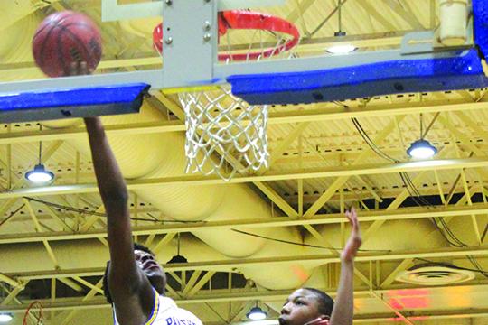 Vanari Johnson goes up for a layup last December for Palatka in a game against Gainesville. (MARK BLUMENTHAL / Palatka Daily News)