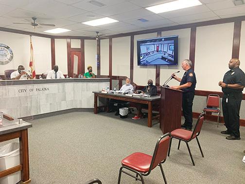 Palatka Fire Chief Chris Taylor and Police Chief Jason Shaw discuss COVID-19 at Thursday night’s commission meeting.