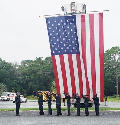 The Putnam County Sheriff’s Office honor guard marks the Sept. 11 ceremony with a 21-gun salute Saturday at the Putnam County Government Complex in Palatka.