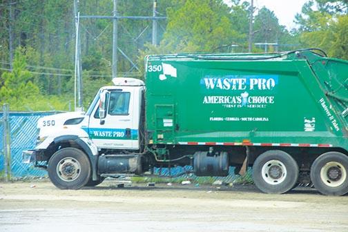 A Waste Pro truck is parked outside the company’s facility in Palatka.