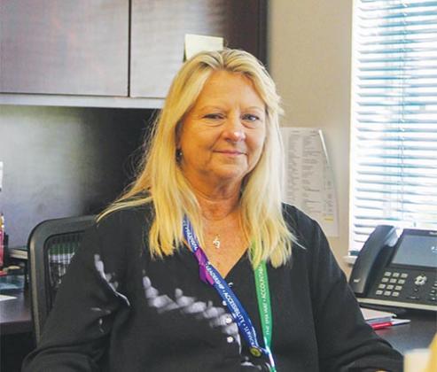 Lynda Tarus, director of the Putnam County Opioid Response Program at SMA Healthcare, sits in her office Friday.