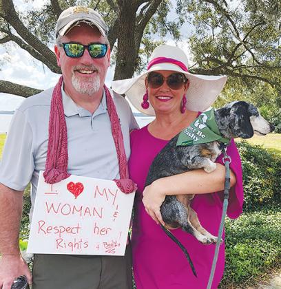 Palatka residents Jane West and Tom Dolan and their pet dachshund come out to downtown Palatka to support women having the right to choose.
