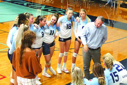 St. Johns River State volleyball coach Matt Cohen talks to his team during a fourth-set timeout against Pensacola State. (MARK BLUMENTHAL / Palatka Daily News)