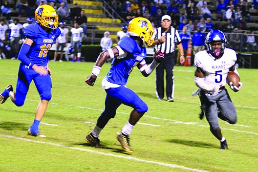 Menendez tailback Tabias Brown tries to elude Palatka defensive back Kamari Betts during their game last week. The Panthers conclude their season at arch-rival St. Augustine Friday. (MARK BLUMENTHAL / Palatka Daily News)  