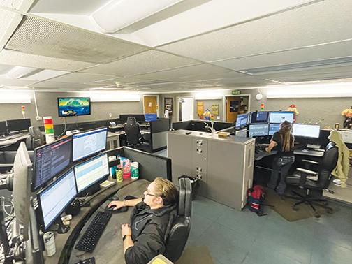 Dispatchers answer calls inside the Putnam County Sheriff’s Office communications center.