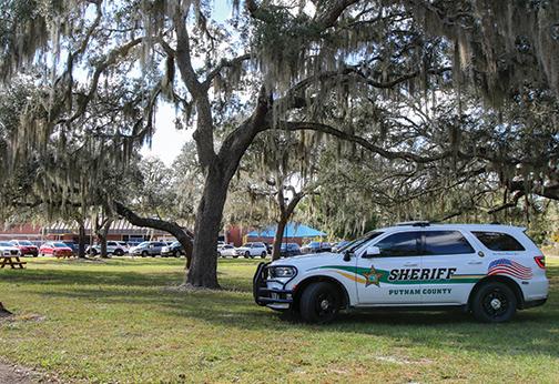 A Putnam County Sheriff’s Office vehicle sits outside Kelley Smith Elementary School on Tuesday as a school-wide lockdown lifts at the Palatka campus.