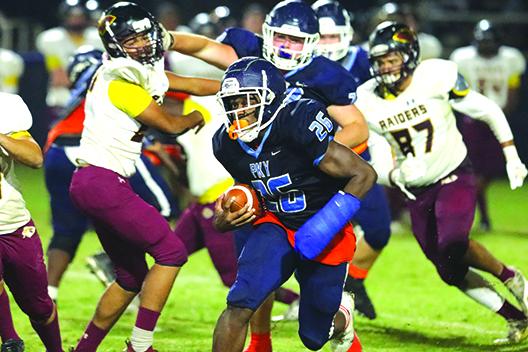 P.K. Yonge running back Kendric Wooden Jr. weaves his way through Crescent City’s defense during Friday night’s game. (BRAD McCLENNY / Palatka Daily News)