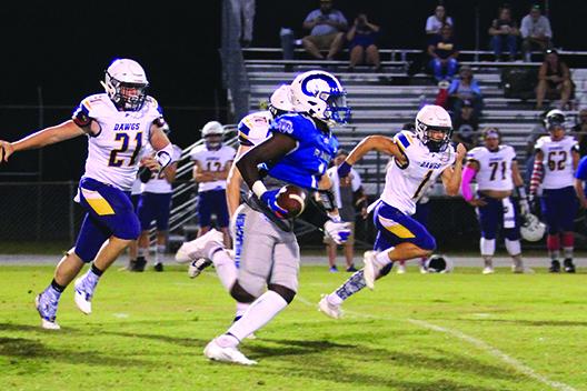 Interlachen quarterback Reggie Allen Jr., here seen going for yards against Bell on Oct. 1, ran for 1,240 yards and 13 touchdowns from his position this season. (MARK BLUMENTHAL / Palatka Daily News)