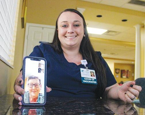 Sharon Matthewson video chats from Ireland on Monday with Rachel Reidenbaugh, a licensed practical nurse from Haven Hospice Roberts Care Center in Palatka.