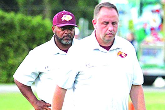 Crescent City coach Sean Delaney (front) saw his Raiders turn a winless 2020 into a playoff berth this season. (MARK BLUMENTHAL / Palatka Daily News)