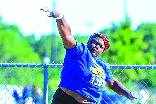 Palatka’s Torryence Poole unleashes the throw that won her the FHSAA 2A girls shot put title on May 8 at the University of North Florida.