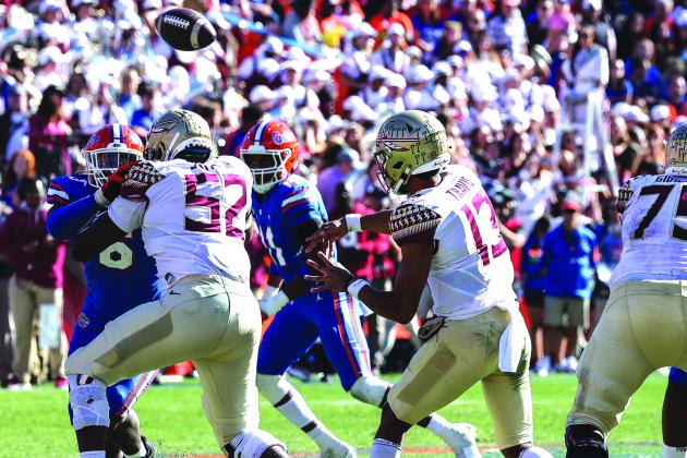 Florida State quarterback Jordan Travis (13) throws a pass during Saturday’s 24-21 loss to Florida. (JOHN STUDWELL / Special to the Daily News) 