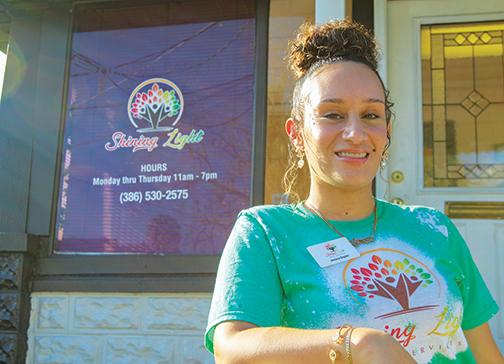 Jessica Boykin, seen here Friday outside Shining Light Peer Services, had several overdose scares before getting clean. Now, she tries to help others who are dealing with drug use.
