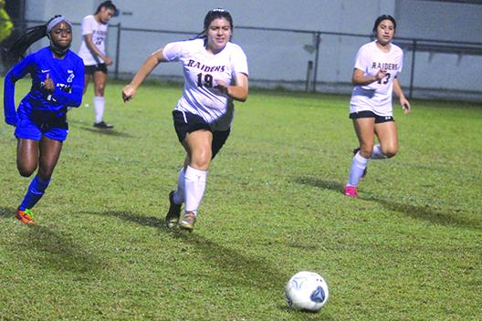 Palatka’s Ymira Passmore (left) and Crescent City’s Vivian Sotelo chase down a loose ball during the first half of Wednesday’s girls soccer match. (MARK BLUMENTHAL / Palatka Daily News)