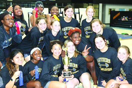 Palatka High girls celebrate with the trophy after winning the county weightlifting championship at home on Wednesday. (COREY DAVIS / Palatka Daily News)
