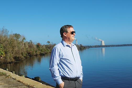 Sam Sullivan, Putnam County’s grants, projects and legislative affairs coordinator, overlooks the St. Johns River at the Palatka Barge Port on Thursday. 