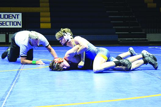 ’s Brandon Lewis has Tocoi Creek’s Lucas Harraway in an armlock during the second period of their 138-pound match Thursday. Lewis would pin Harraway to secure the Panthers’ 38-30 victory. (MARK BLUMENTHAL / Palatka Daily News)