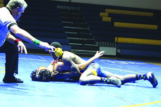 Palatka’s Johnson Session has Tocoi Creek’s Aaron Rodriguez in pin position during the first period of their match Thursday night. Session recorded the pin in just 29 seconds as the Panthers won, 38-30. (MARK BLUMENTHAL / Palatka Daily News)