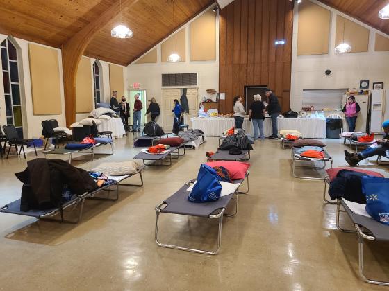 Cots are set up inside Westminster Hall at First Presbyterian Church.