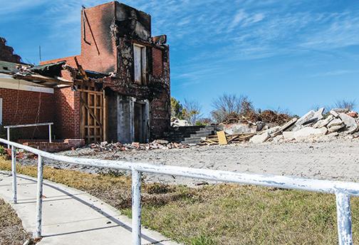 The Florida Furniture building is in shambles after a fire in December.