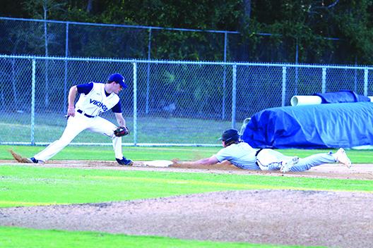 Northwest Florida State’s Brant Smith slides safely into third base ahead of the tag attempt by St. Johns River State College’s Maverick Stallings after a second-inning wild pitch. (MARK BLUMENTHAL / Palatka Daily News)