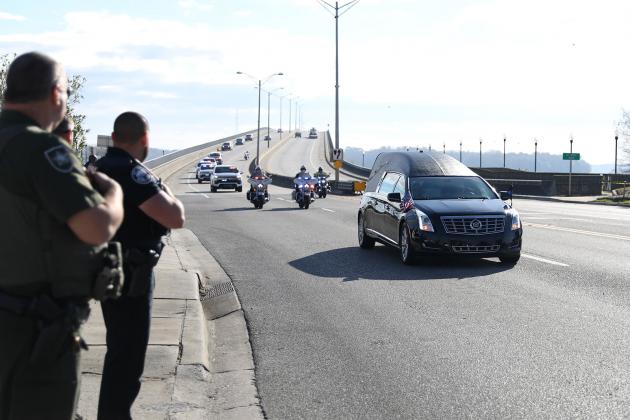 Photos courtesy of the Putnam County Sheriff's Office. Deputies watch as a processional for a fallen Hillsborough County deputy travels Wednesday over Memorial bridge in Palatka.