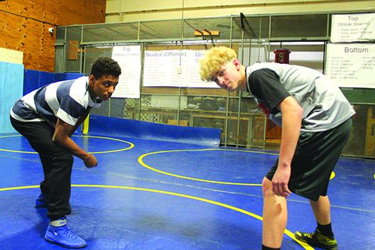 Palatka's Mikade Harvey (left) and Brandon Lewis won quarterfinal-round matches at the FHSAA 1A wrestling championships in Kissimmee, but then fell later Friday in semifinal matches. Both will battle in wrestlebacks today.