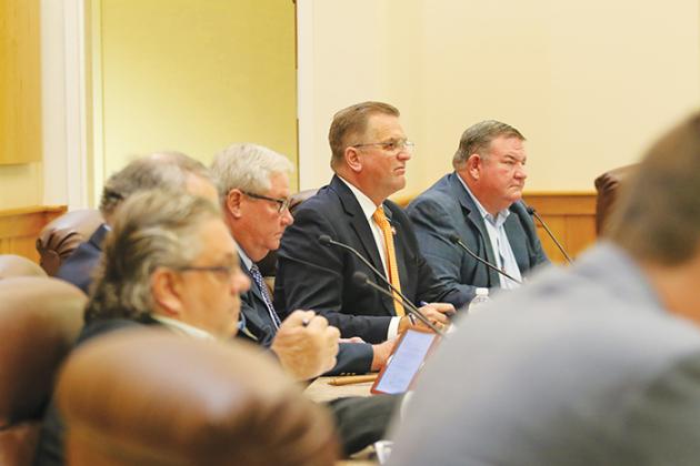 The Putnam County Board of Commissioners listens to conversations Tuesday about the county potentially having a seat on the statewide seaport council.