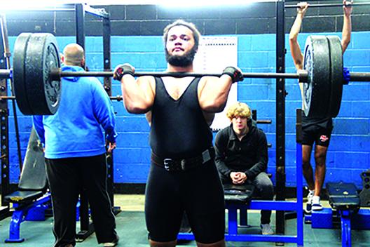  Interlachen’s Nate Jenkins gets set to finish his clean-and-jerk attempt in winning the District 8-1A championship at 238 pounds. (COREY DAVIS / Palatka Daily News)