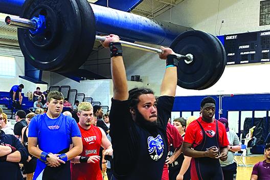Interlachen’s Nate Jenkins tries to complete the clean and jerk in the 238-pound competition in the Region 2-1A championship. (COREY DAVIS / Palatka Daily News)