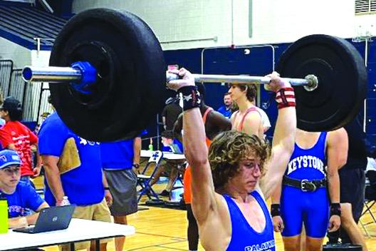 Palatka’s Kyler Smith, who took third at the 139-pound weight class, lifts in the clean-and-jerk competition on Friday at Keystone Heights High School. (COREY DAVIS / Palatka Daily News)