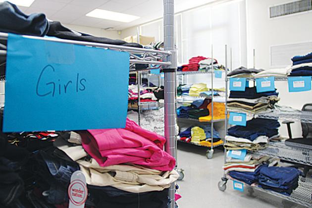 Racks of new clothes at the C.L. Overturf Jr. District Center in Palatka are available for homeless Putnam County students.