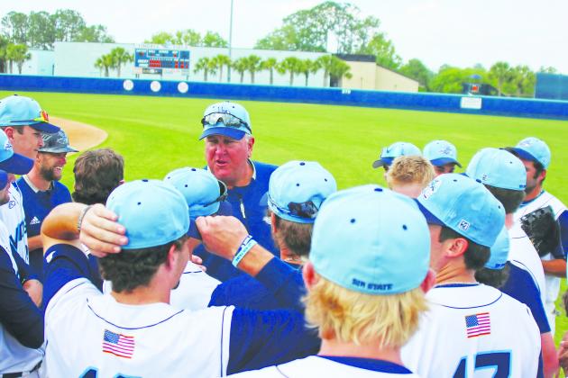 St. Johns River State College baseball coach Ross Jones addresses his team moments after his team clinched a postseason berth with a 10-0 win over Daytona State. (RITA FULLERTON / Special To The Daily News)