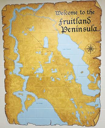 Former art teacher Esme Coward freehand-painted this map of the Fruitland Peninsula for the Margary Neal Jones Nelson Archives at the former George C. Miller Middle School.