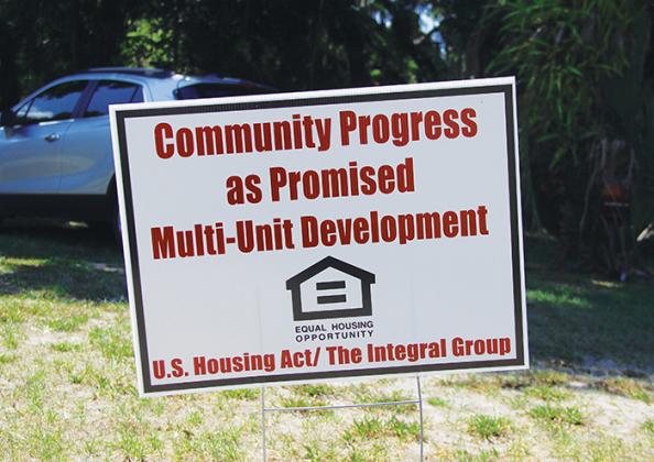 A sign stands in the field beside Hammock Hall Monday morning, alluding to a "multi-unit development." City Manager Don Holmes said Hammock Hall has not been sold and he does not know who put up this sign.