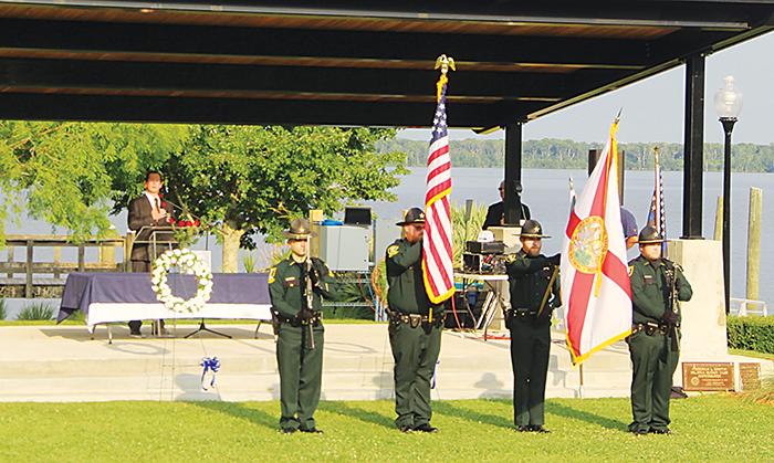 Putnam County sheriff's deputies present the colors at Tuesday's memorial service.