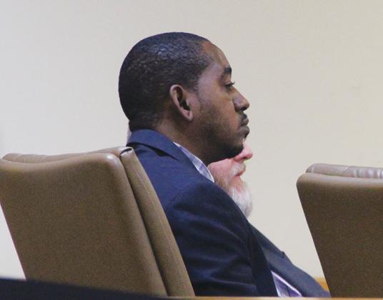 Rondale King, who is accused in the fatal shooting of Jahme Jones on New Year’s Eve in 2018, listens to opening statements at his manslaughter trial Tuesday morning.