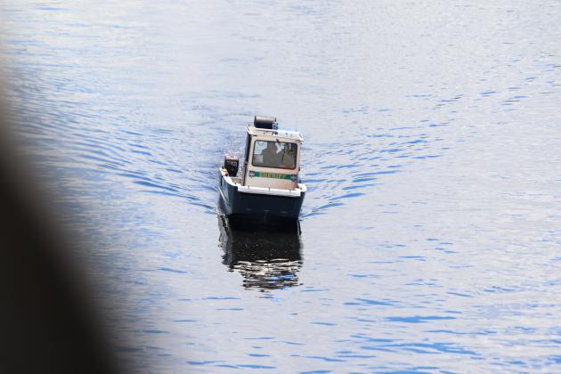 Photo by Sarah Cavacini/Palatka Daily News. A Putnam County Sheriff's Office boat searches Tuesday for a man who reportedly jumped from Memorial Bridge that day. 