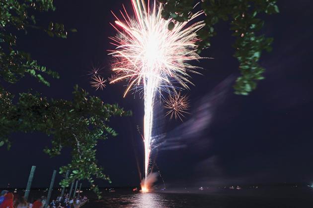 Fireworks explode over the banks of the St. Johns River in Palatka on Monday as revelers take part in the city’s Independence Day celebrations.