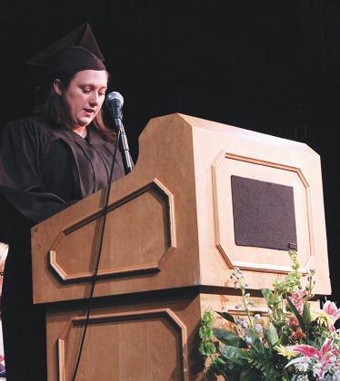 Erica Mulvihill, a recent adult education graduate, speaks to the crowd at the St. Johns River State College ceremony.