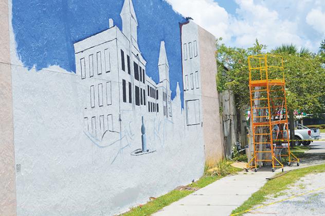 Work has begun on a mural that will depict the Putnam House Hotel that was built in 1885 and was torn down in 1922.