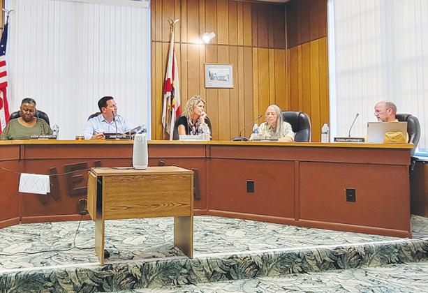 Welaka Town Attorney Patrick Kennedy, right, discusses the need for updating the town’s land development code during a town council meeting recently.